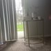 Glass top gold corner table