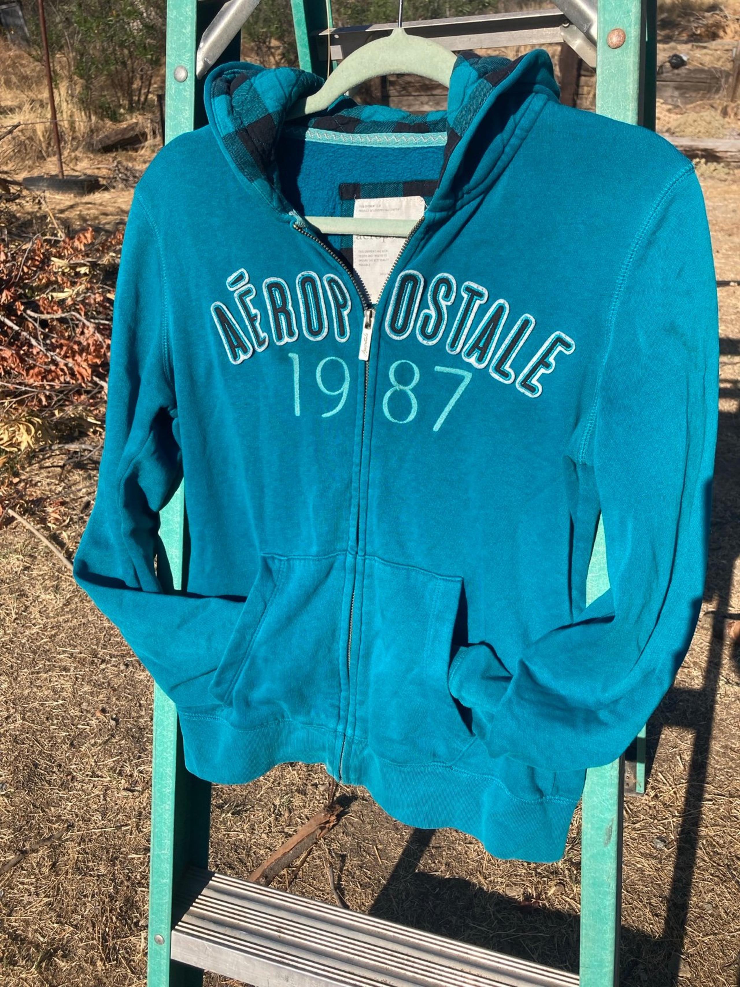 3 sweaters and 1 Wind Breaker