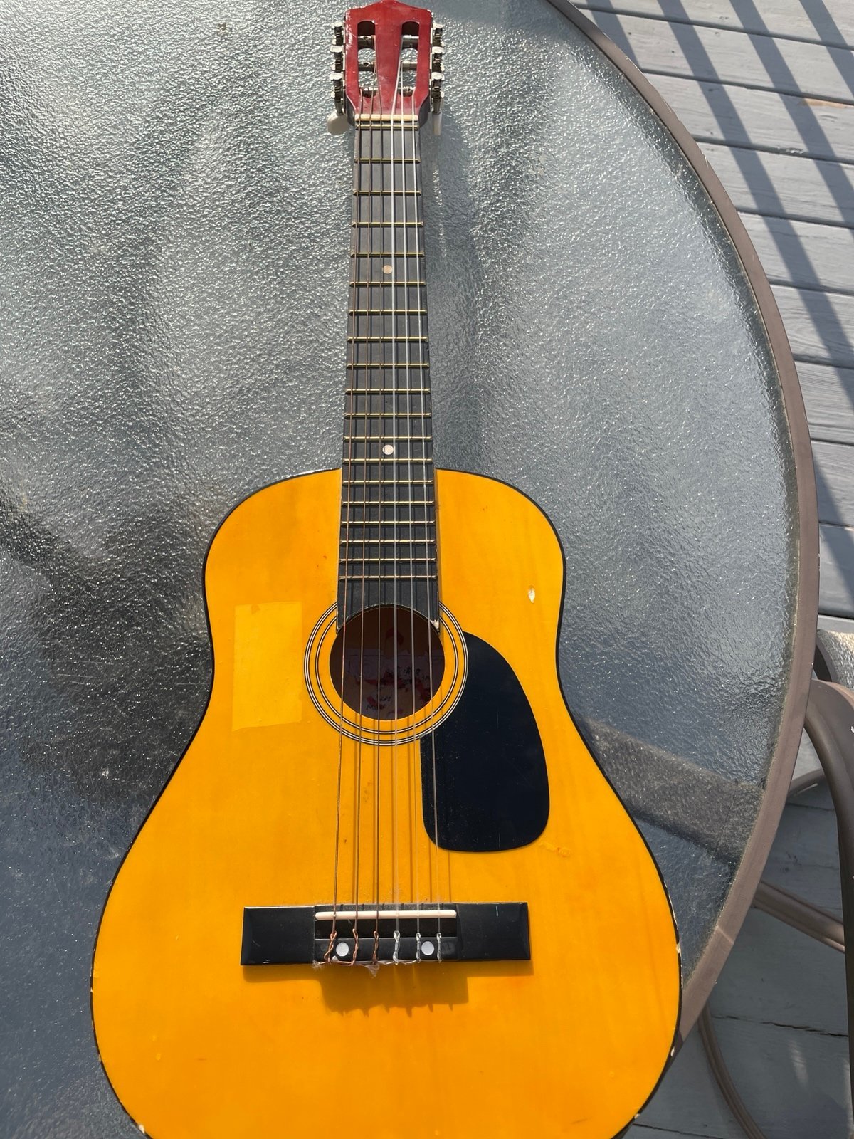 SMALL acoustic guitar (used) still in good condition