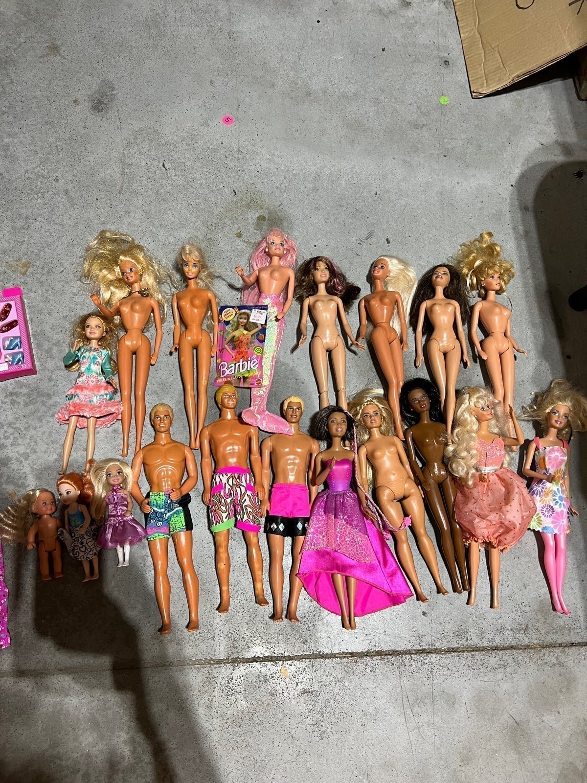 (17) some vintage Barbie’s and Kens Barbie dolls