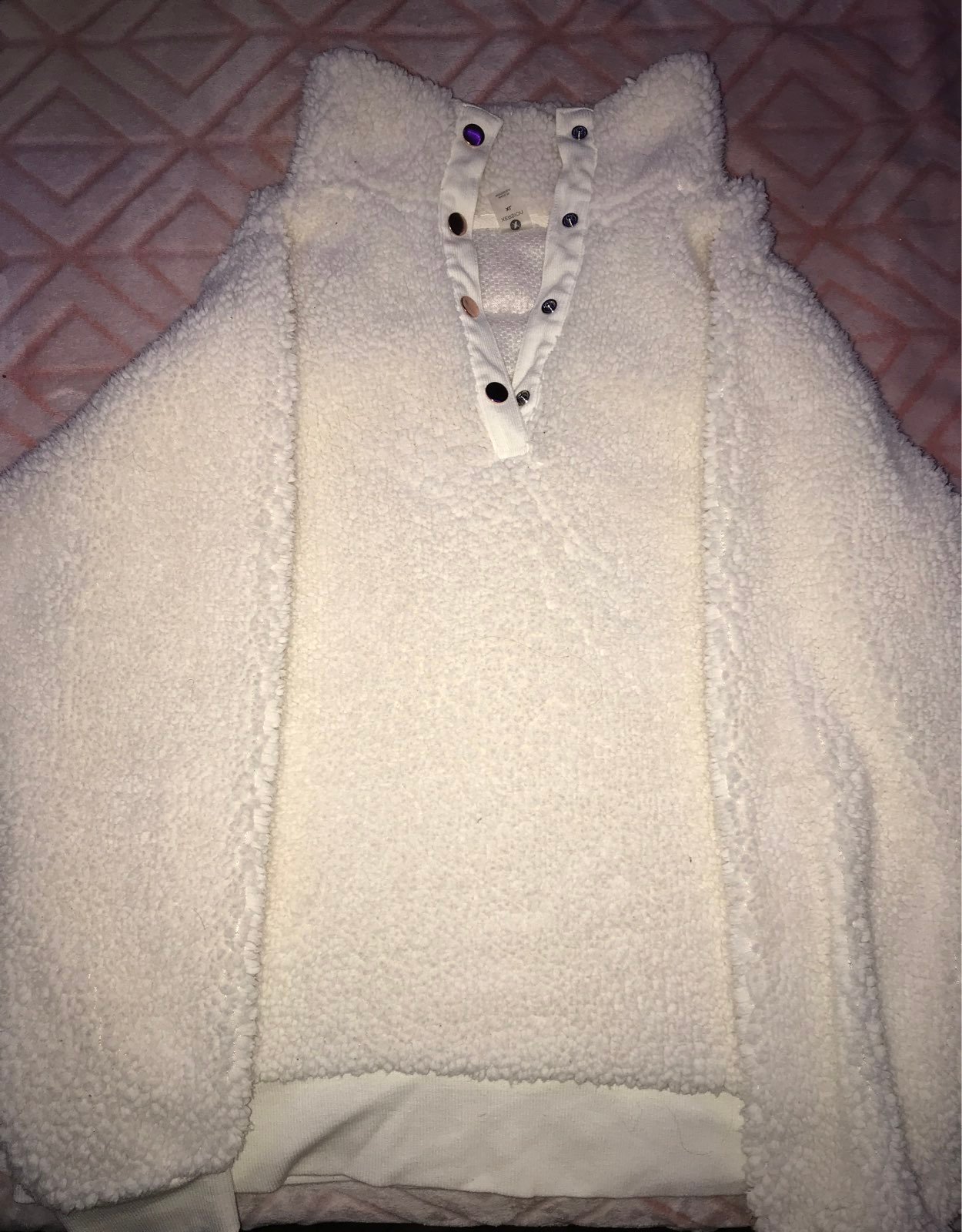 A furry half button-up sweatee