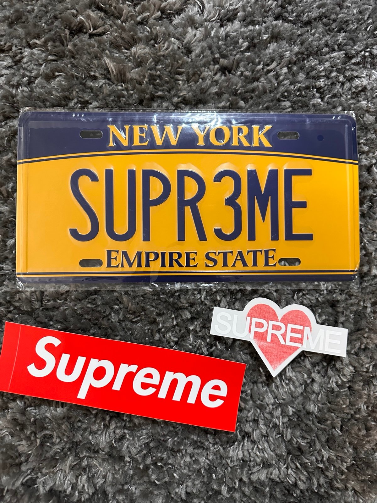 Supreme NY license plate