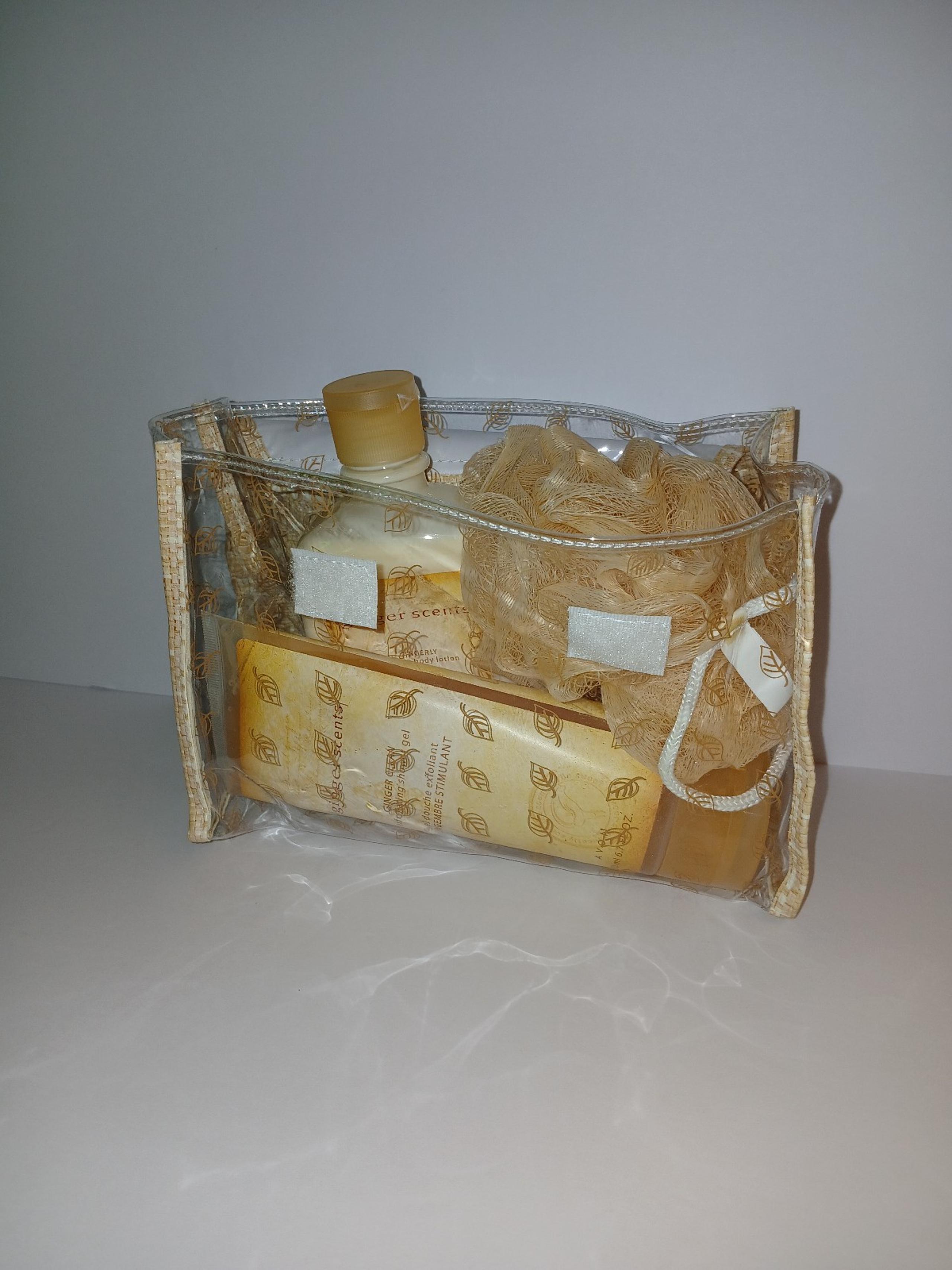4 piece set ( Body lotion, shower gel, mesh pouf, bag)