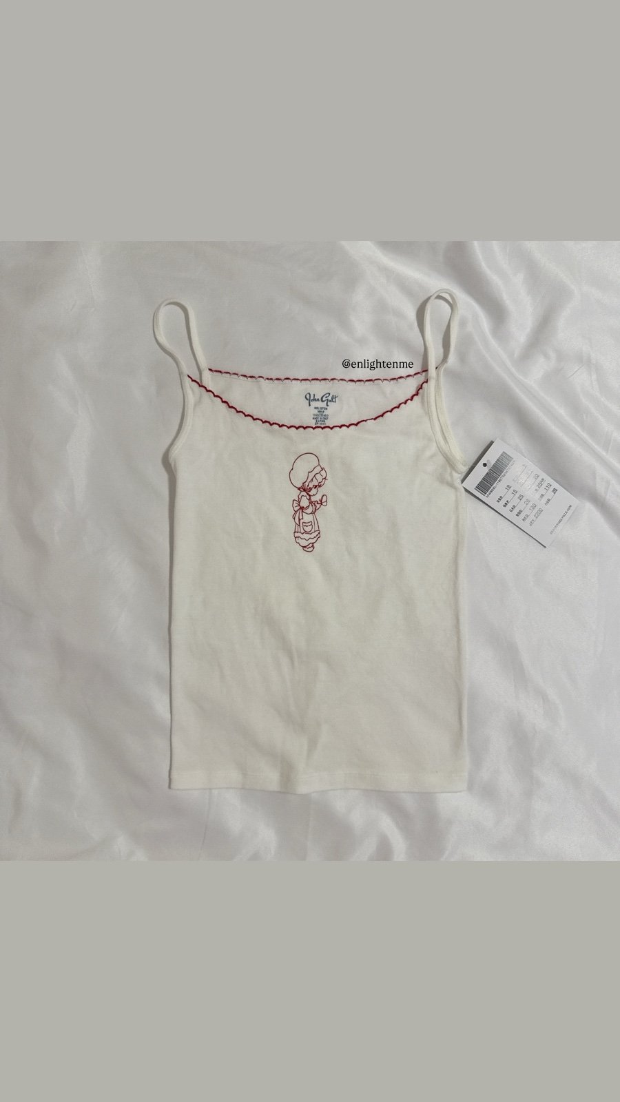 Unused with tags, melt the lady Logo cross camisole. Camisoles