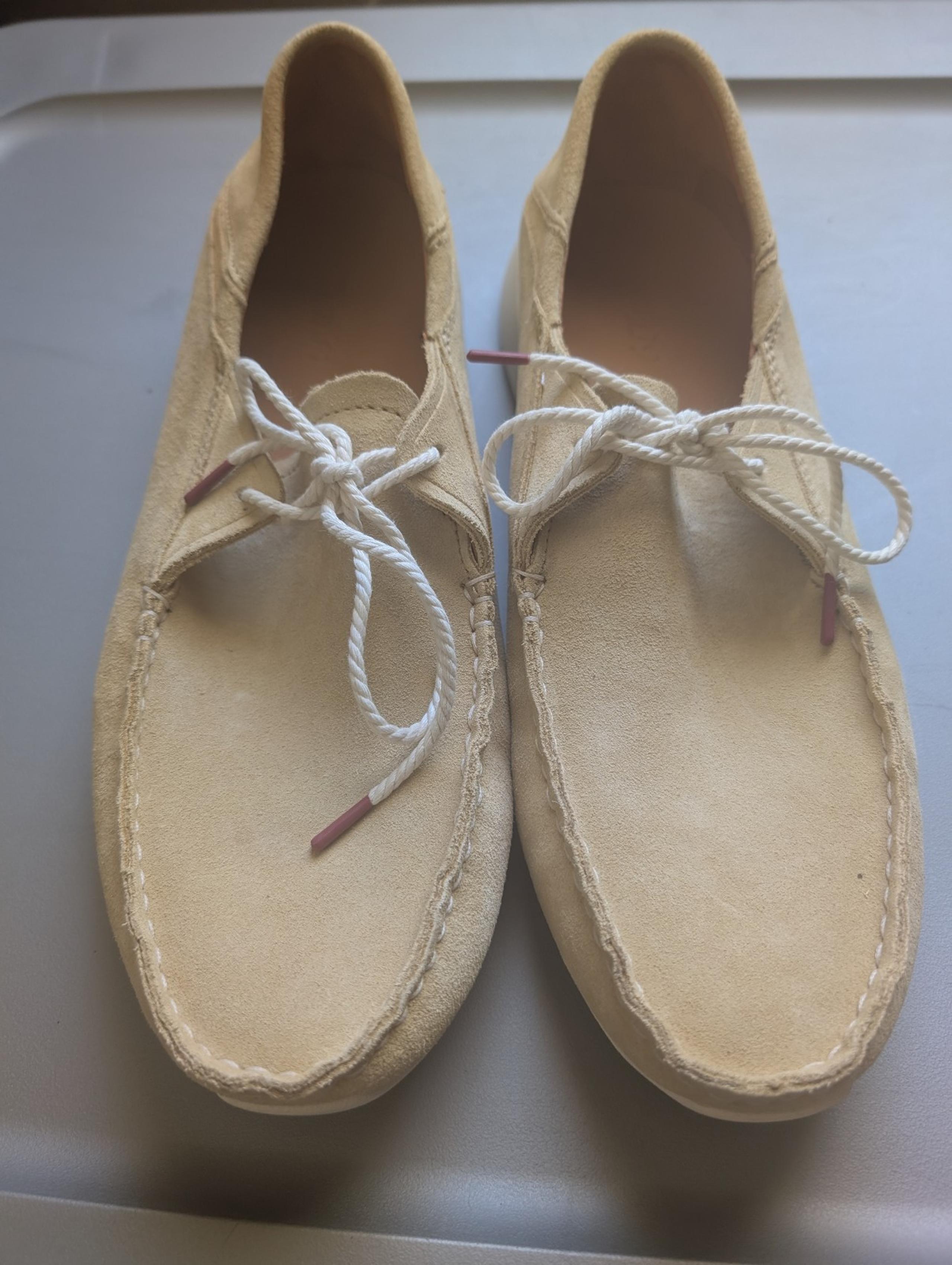 men's olukai Tan driver  suede loafers with white laces  size 11