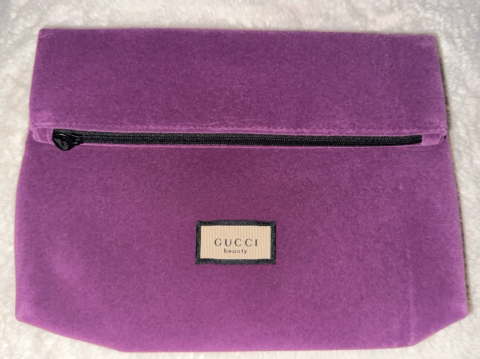 Purple Gucci beauty pouch