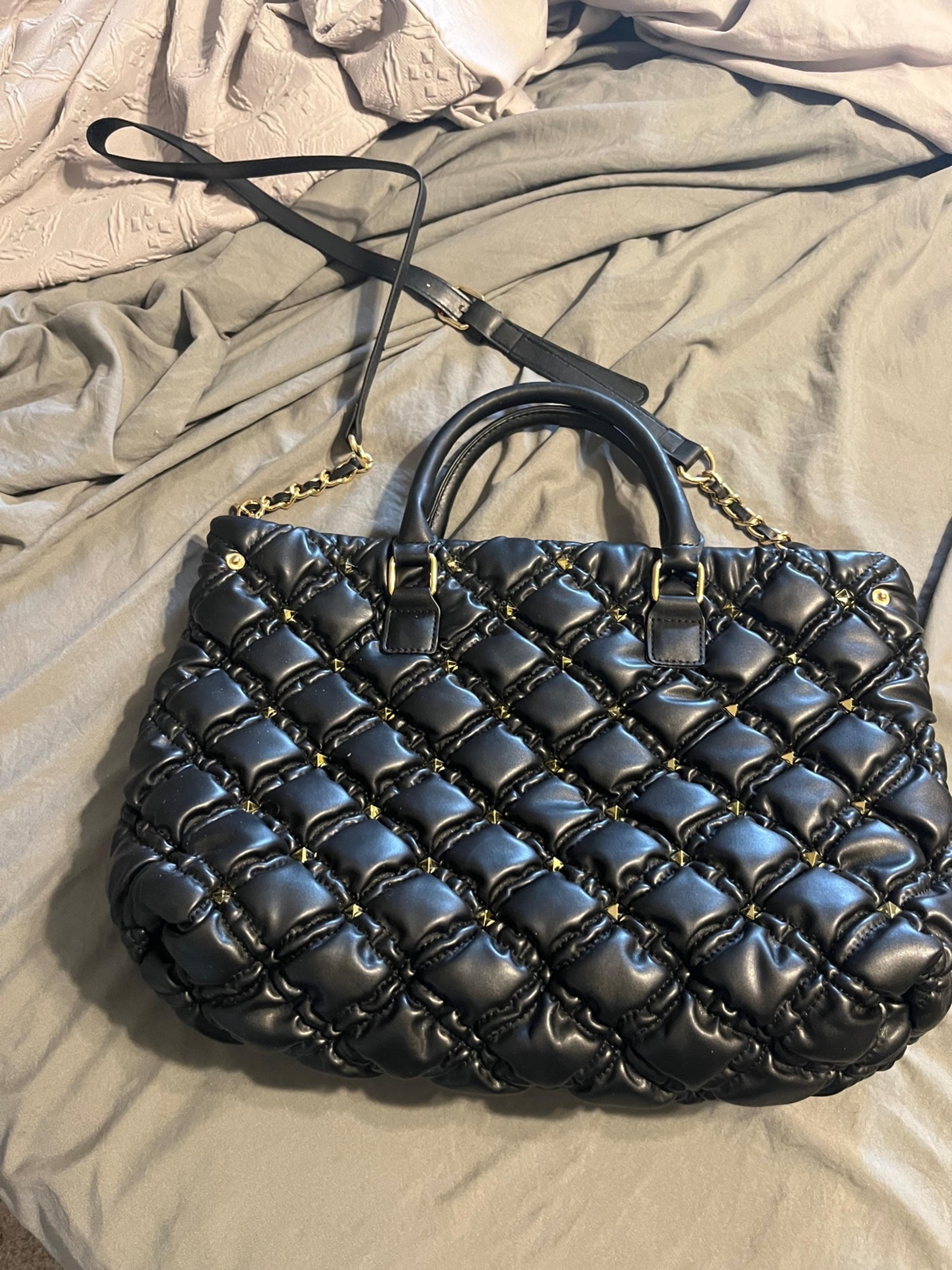 JustFab black quilted bag