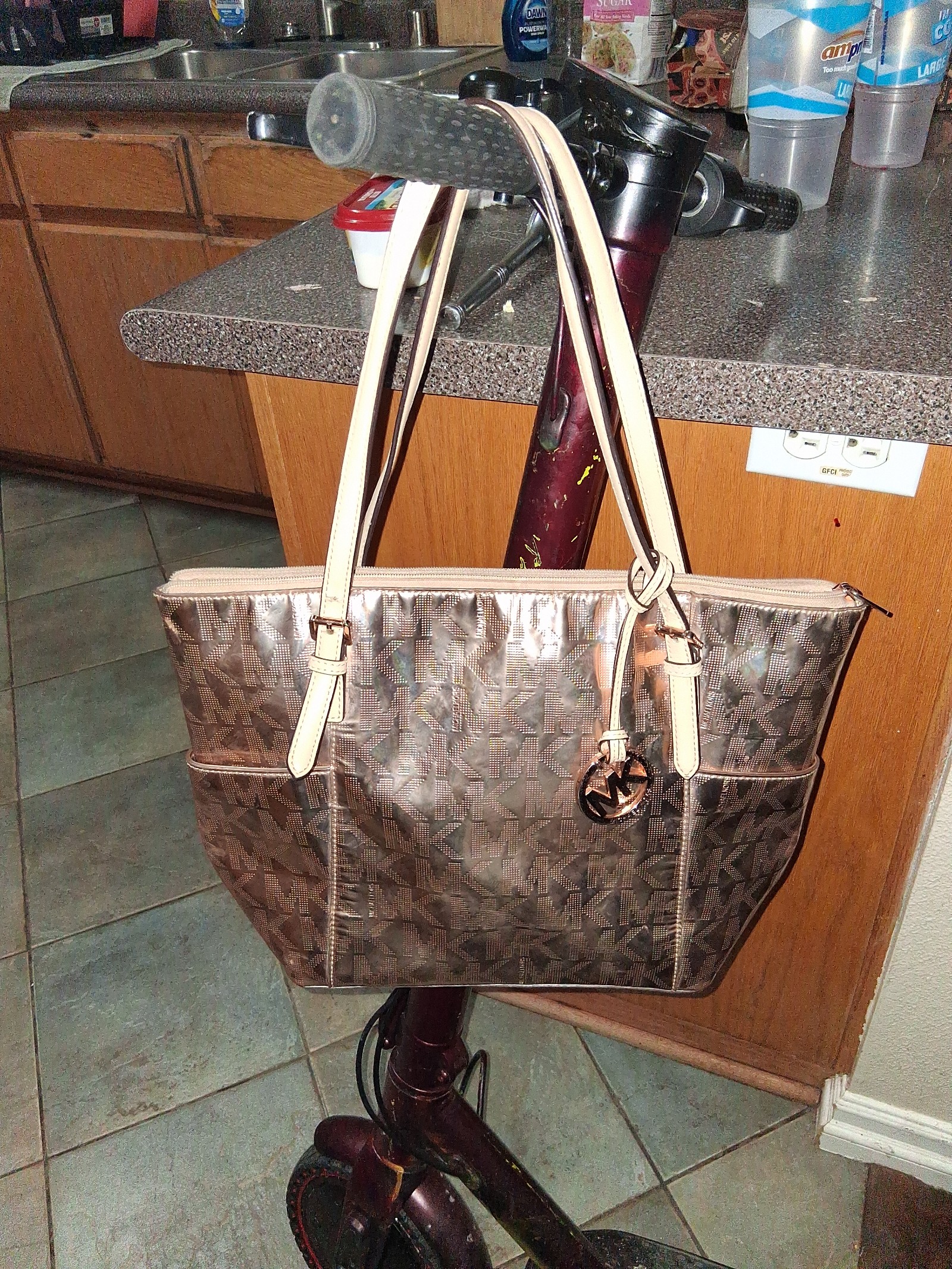 Micheal Kors gold hand bag