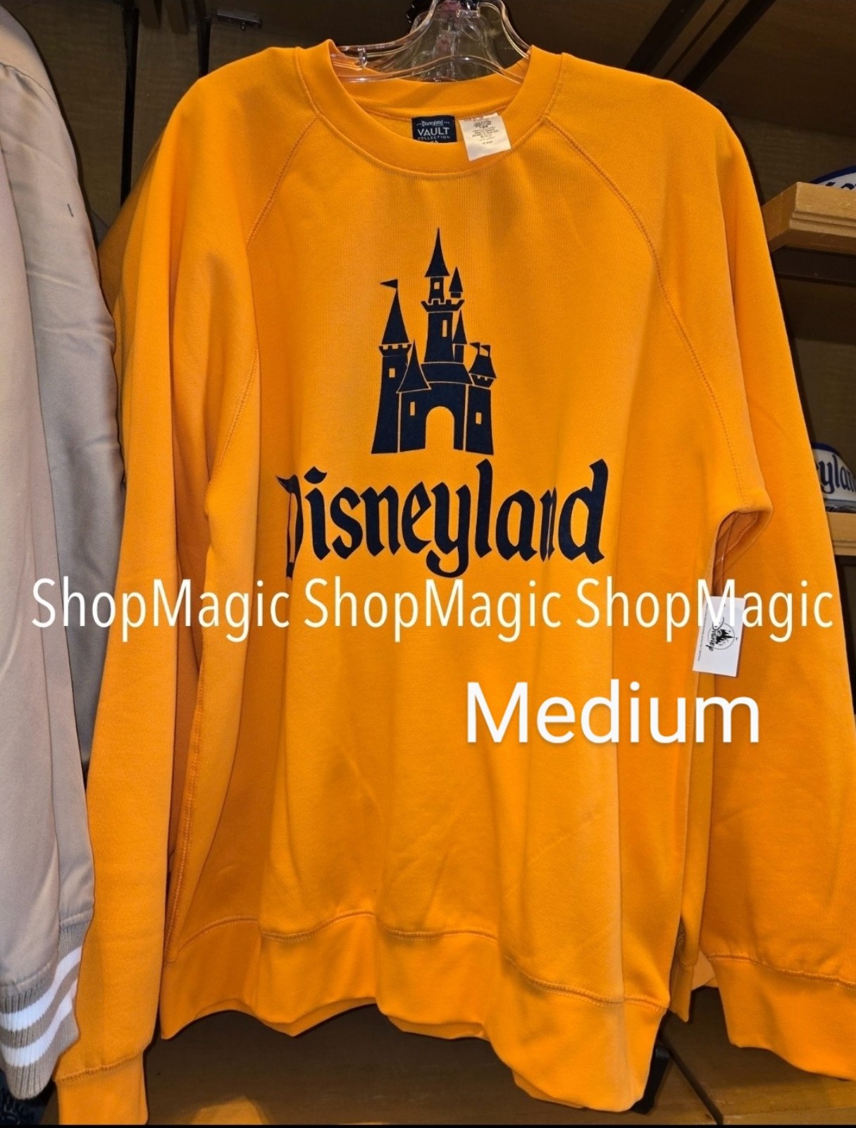 Disney Parks Disneyland 70th Celebration Vault Collection Orange PulloverSweater