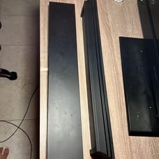 2 long black shelves