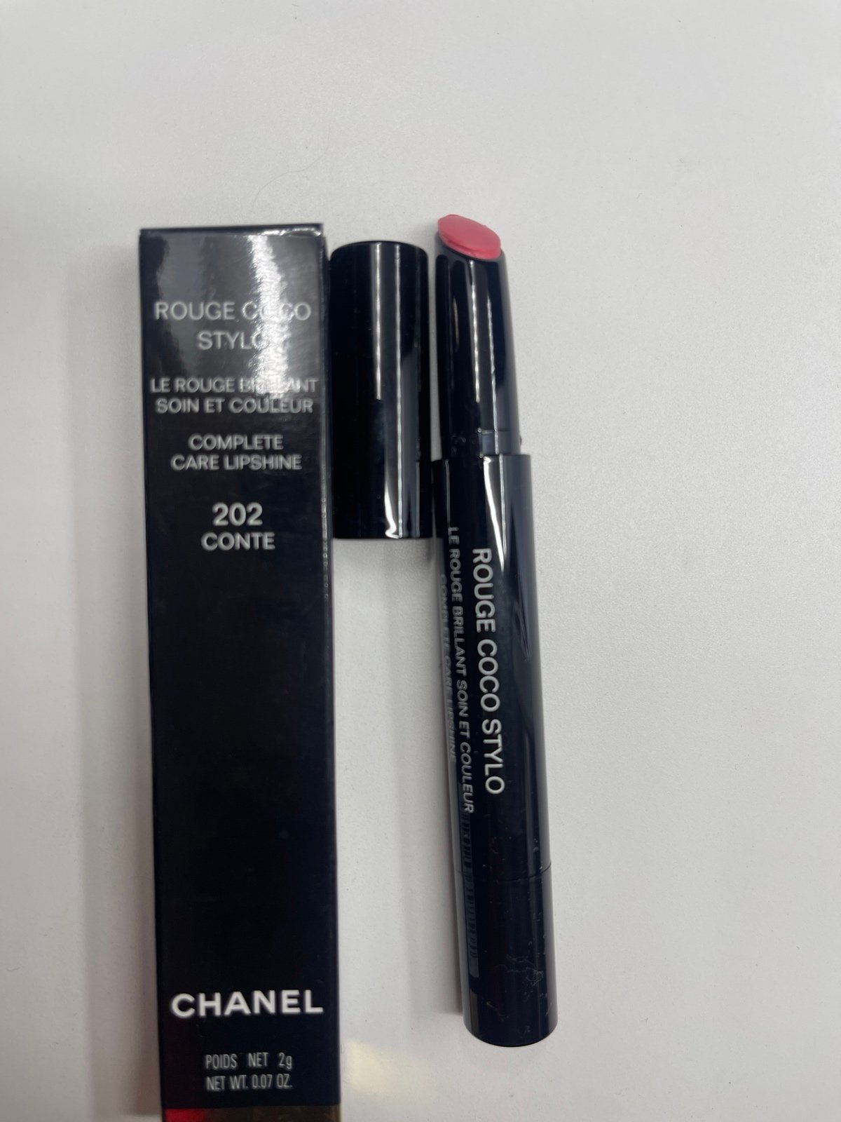 Chanel Rouge Coco stylo Complete Care Lipshine 202 Conte. ( 954/MX4)