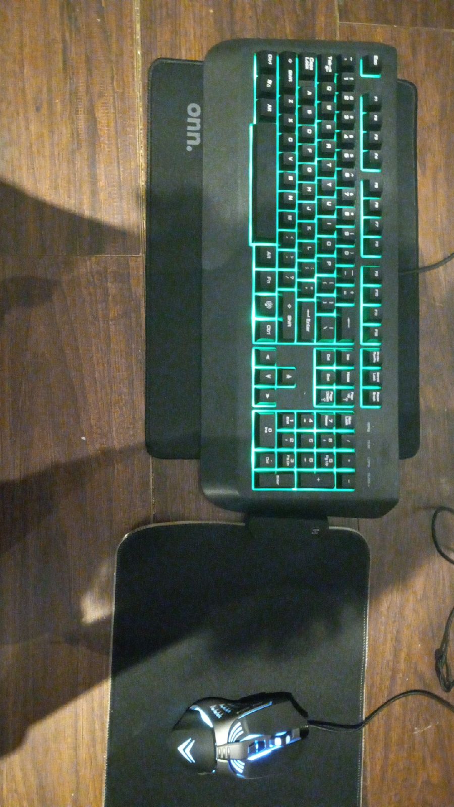 A mouse pad and a key pad and a keyboard and a mouse