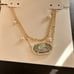 Kendra Scott gold necklace
