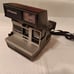 Vintage Polaroid Sun600 Camera with bag and film