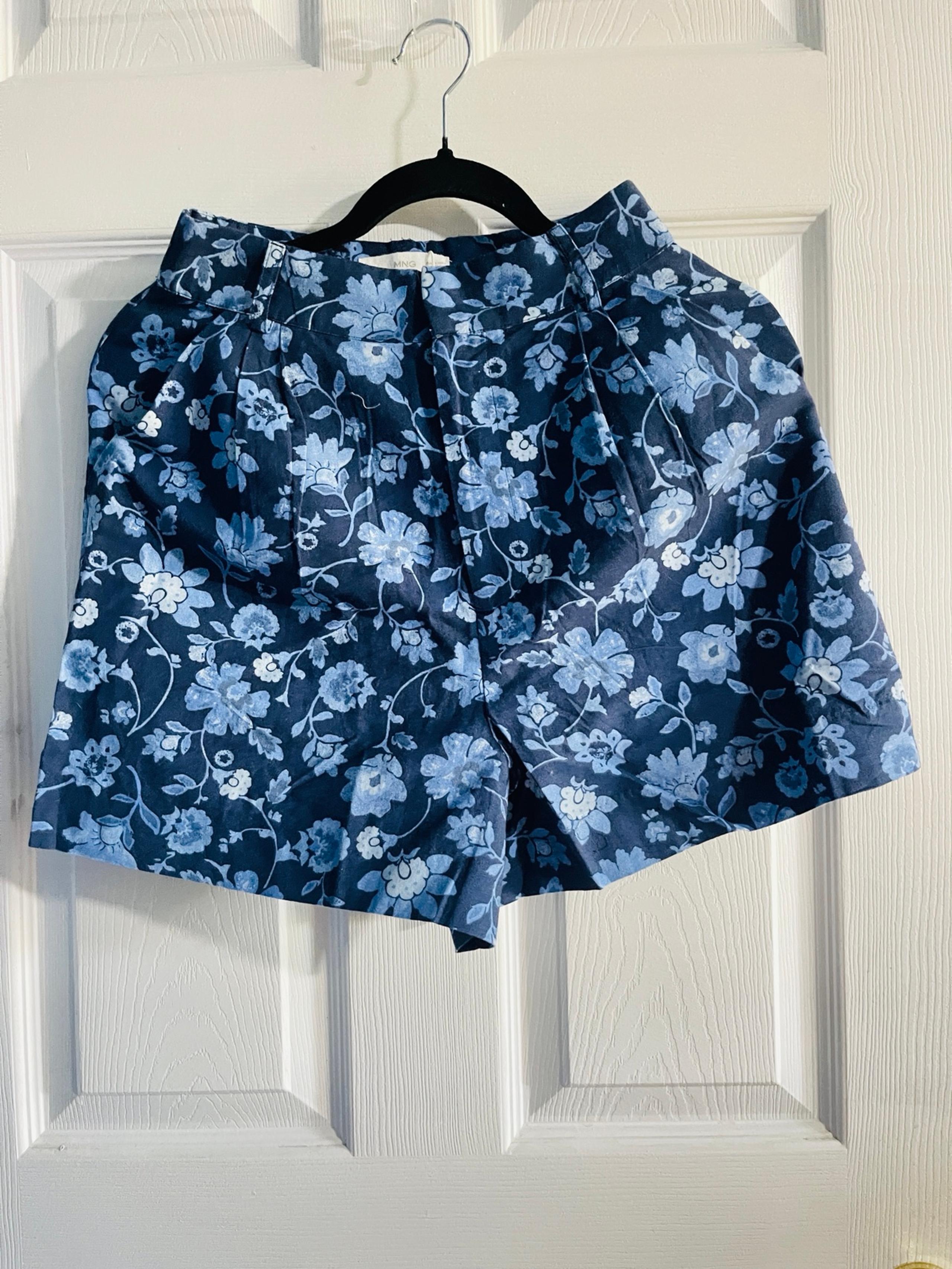 34 size mango women blue beautifully printed shorts with belt buckle and two poc