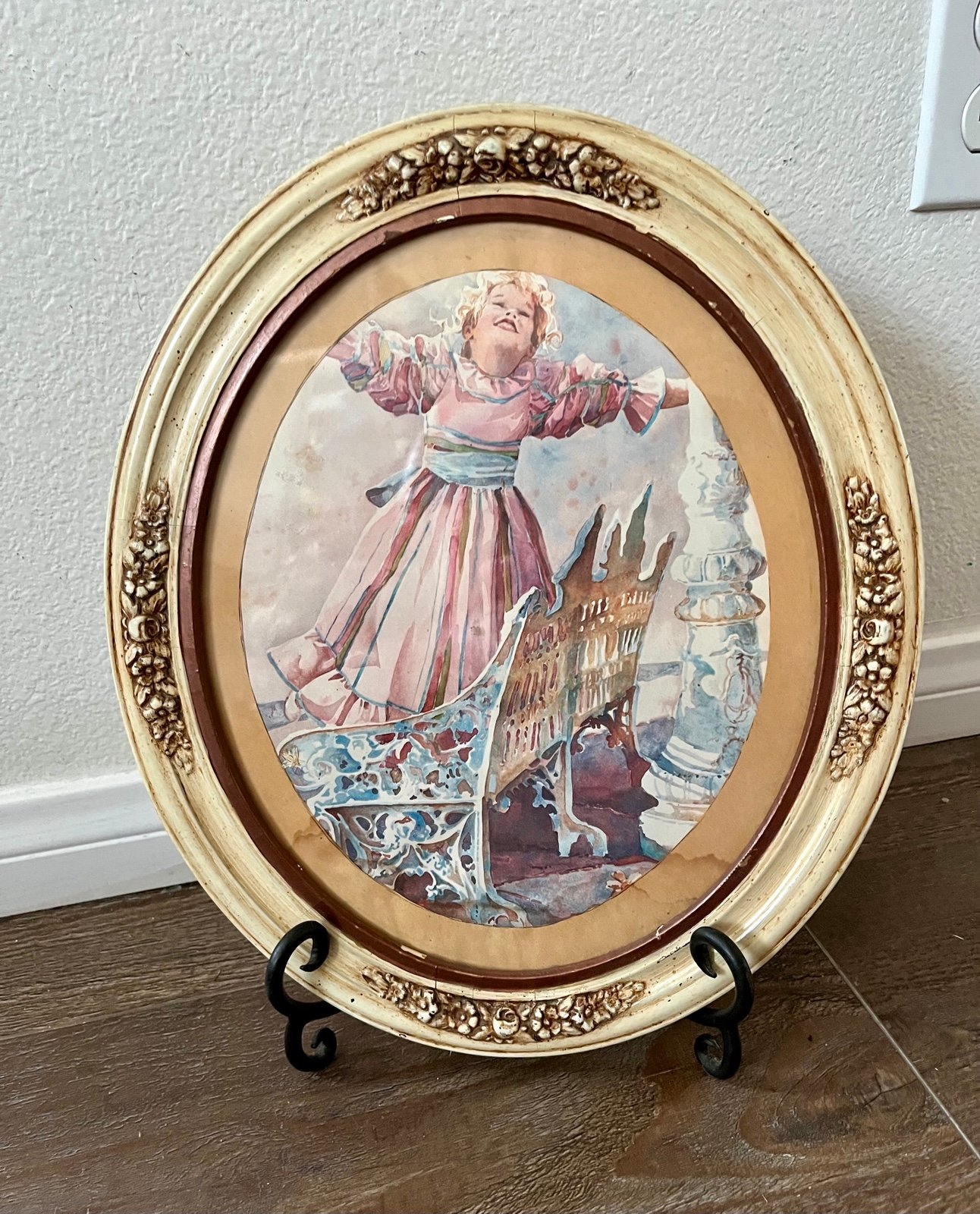 Oval Framed Artwork with Child and Cradle