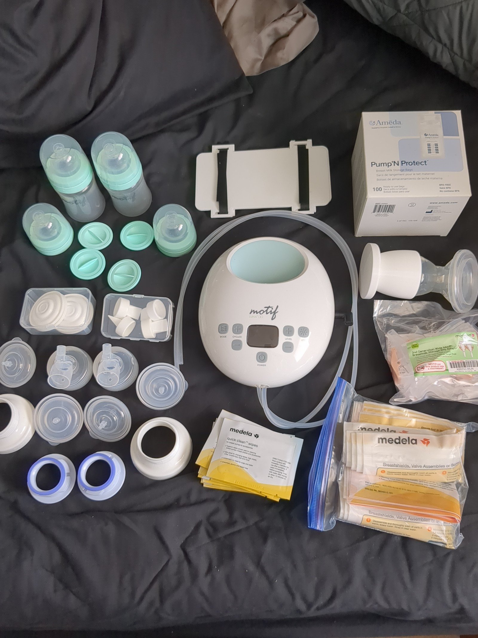 Motif Luna Battery Breast Pump with many accessories