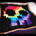 Granny Square rainbow pixel skull blanket