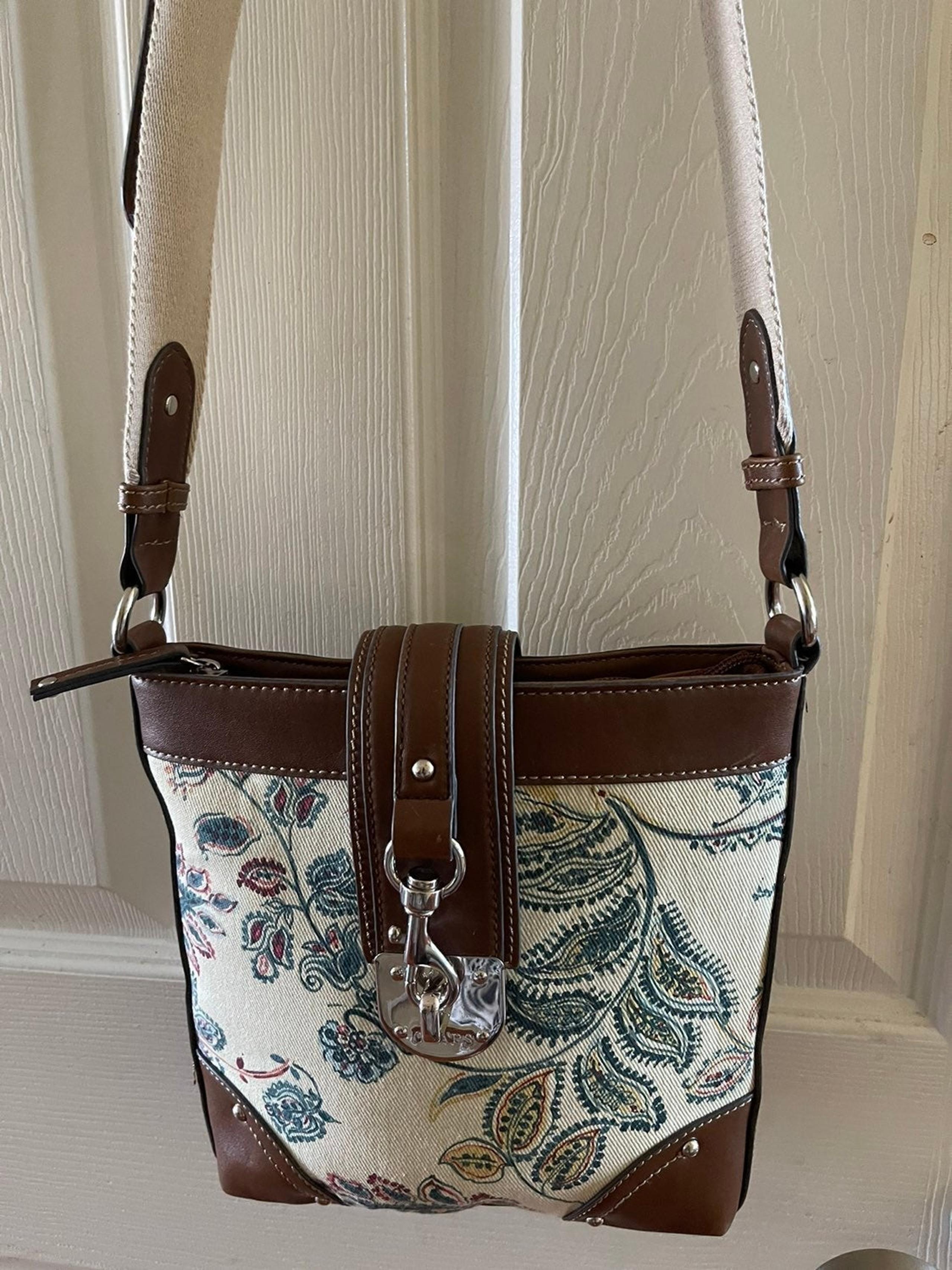 CHAPS canvas floral prints with brown trims and silver accents crossbody bag