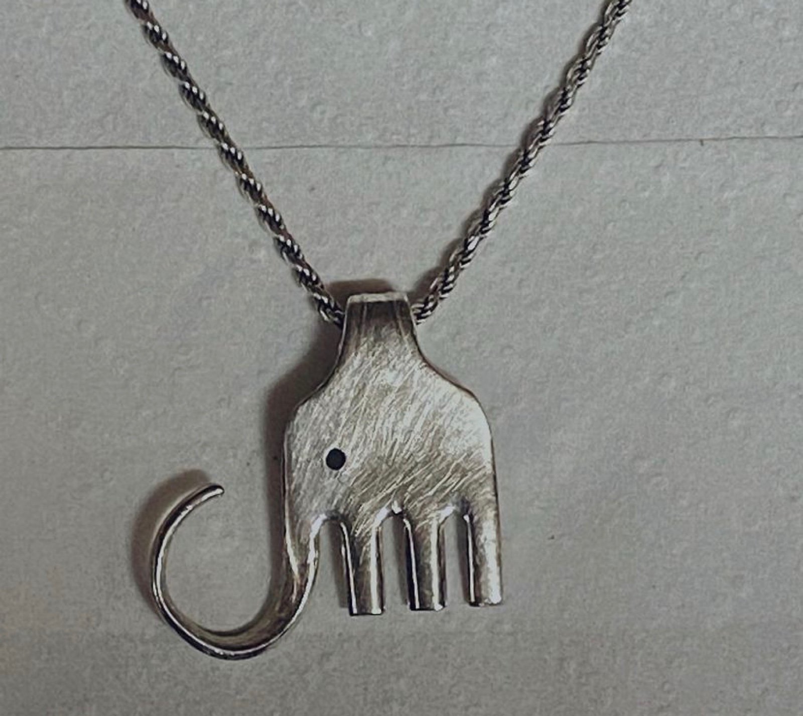 Sterling silver pendant made from silver fork