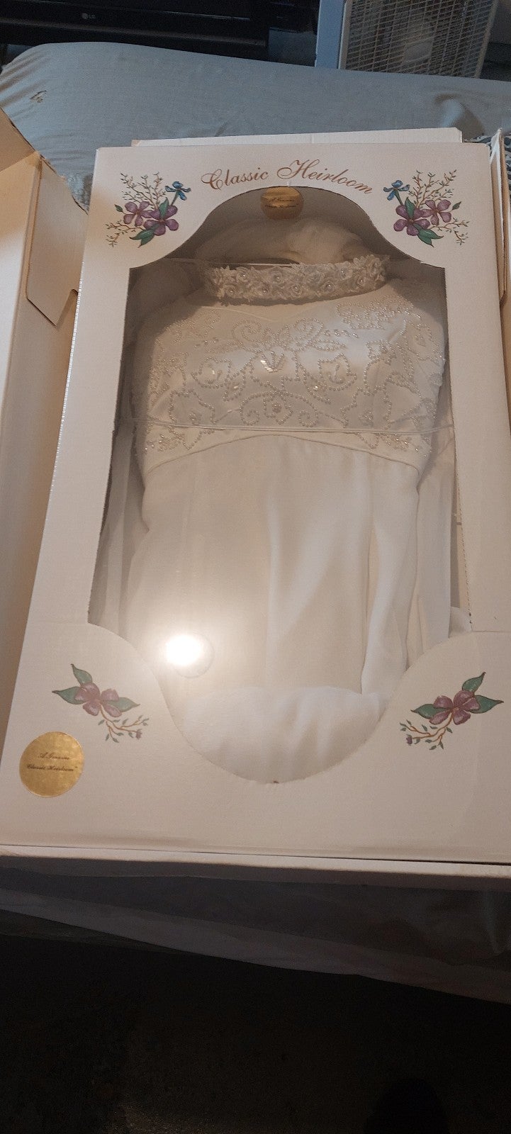 Wedding gown with headpiece and vale