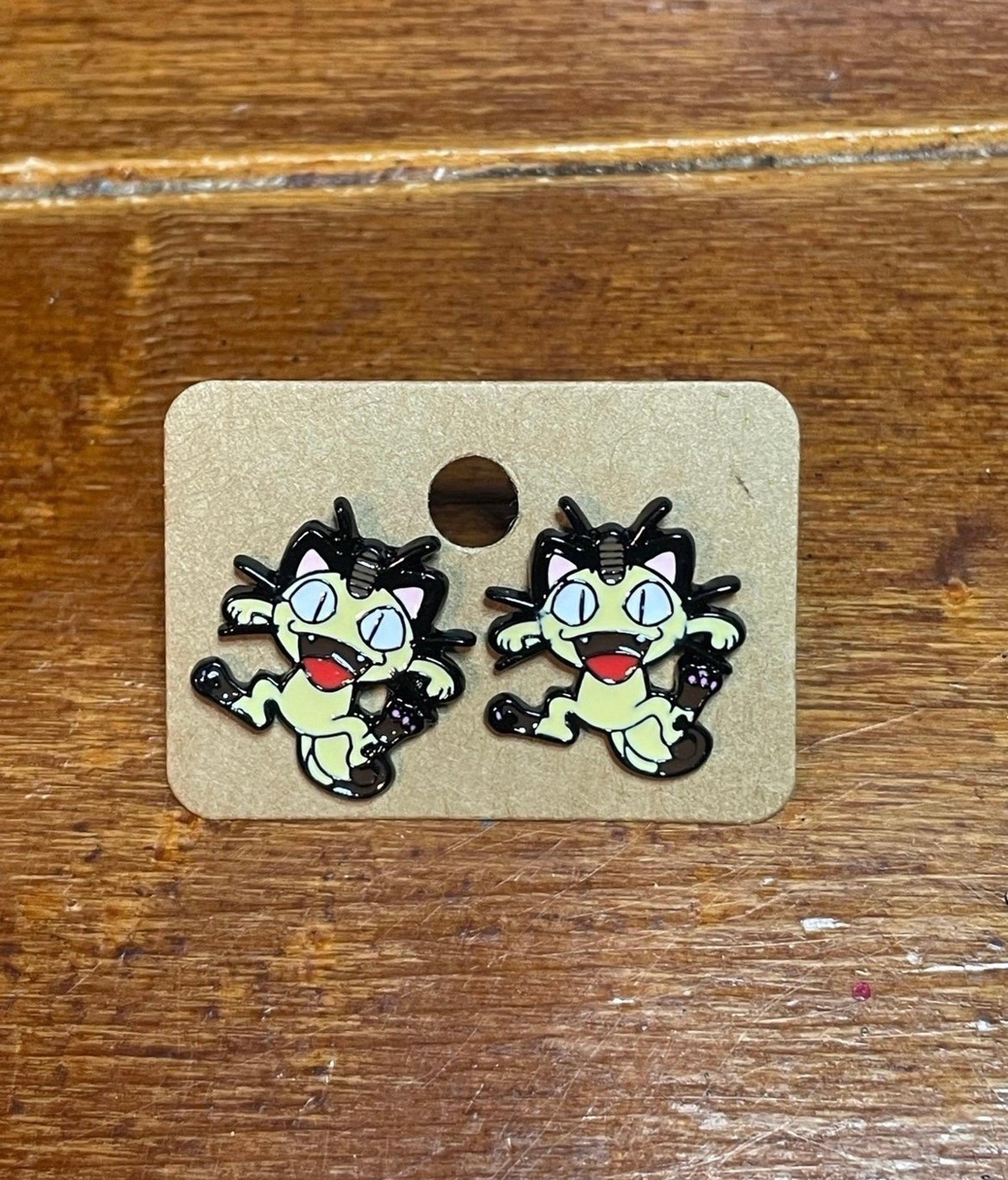 Meowth earrings