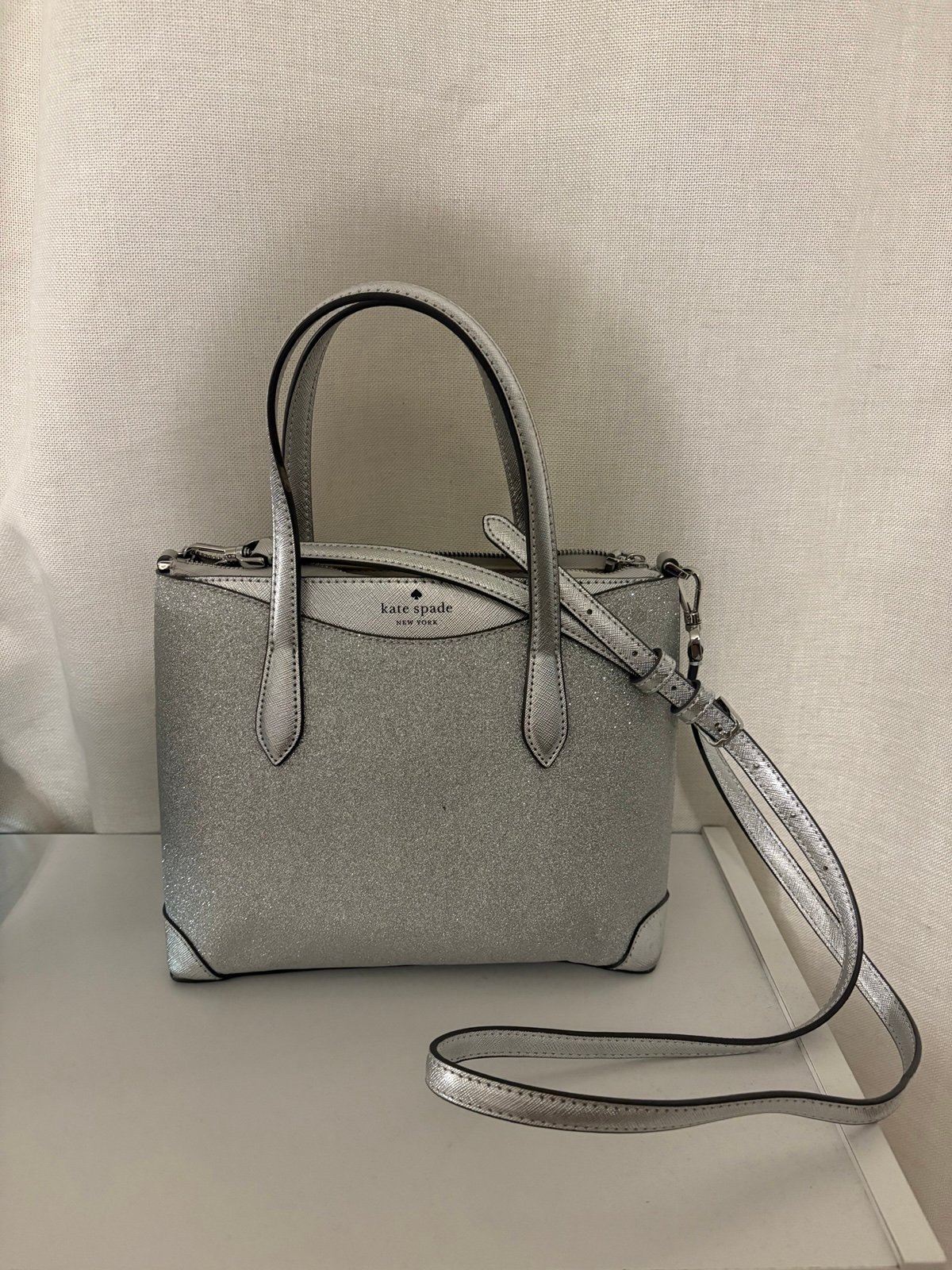 Kate Spade silver glitter purse