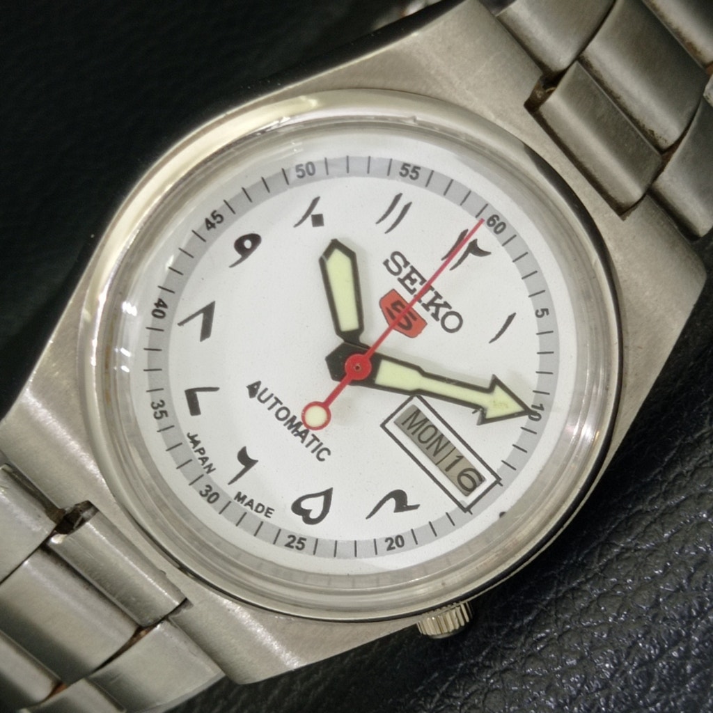Vintage 1987 Arabic Seiko Automatic Mens Silver Watch W/daydate & White accents