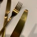 4 sets matte gold silverware from H&M