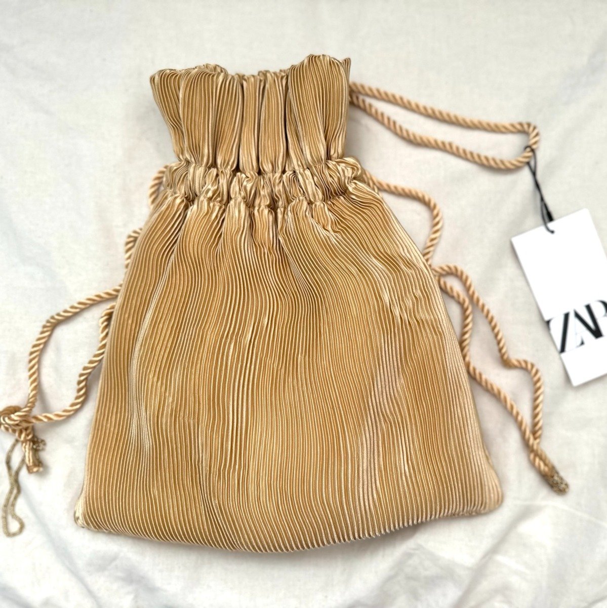 NWT Zara Gold pleated Bucket Bag with Pearl detail Tassel