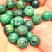 Lot of 62 green 6mm beads, possibly turquoise