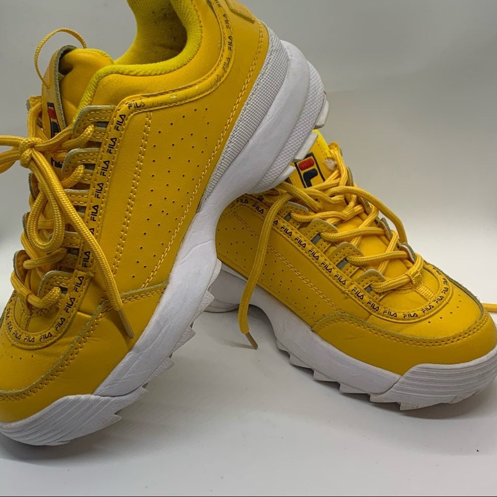 white and yellow filas