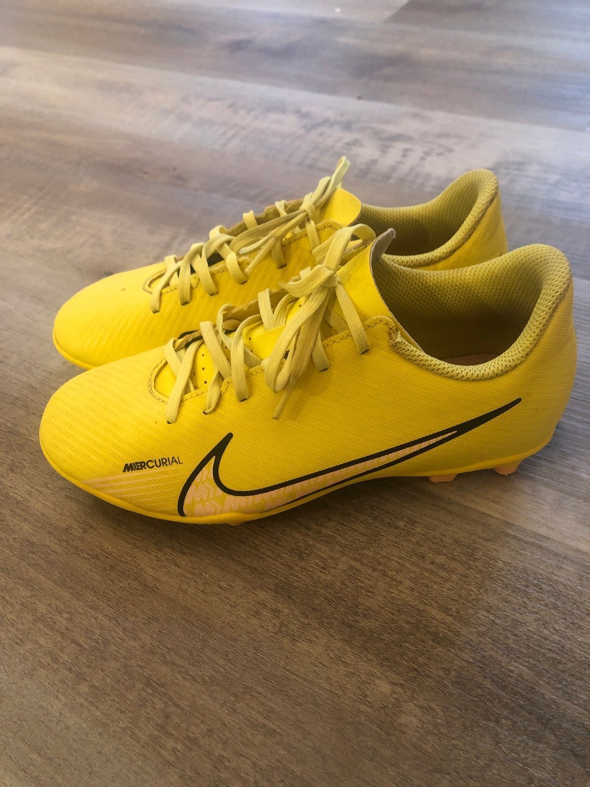 Nike size 4Y mercurial yellow and pink soccer cleats
