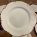Set of 18 carat gold Homer Laughlin plates + 3 espresso cups/1 stein