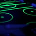 Black light air hockey table top game