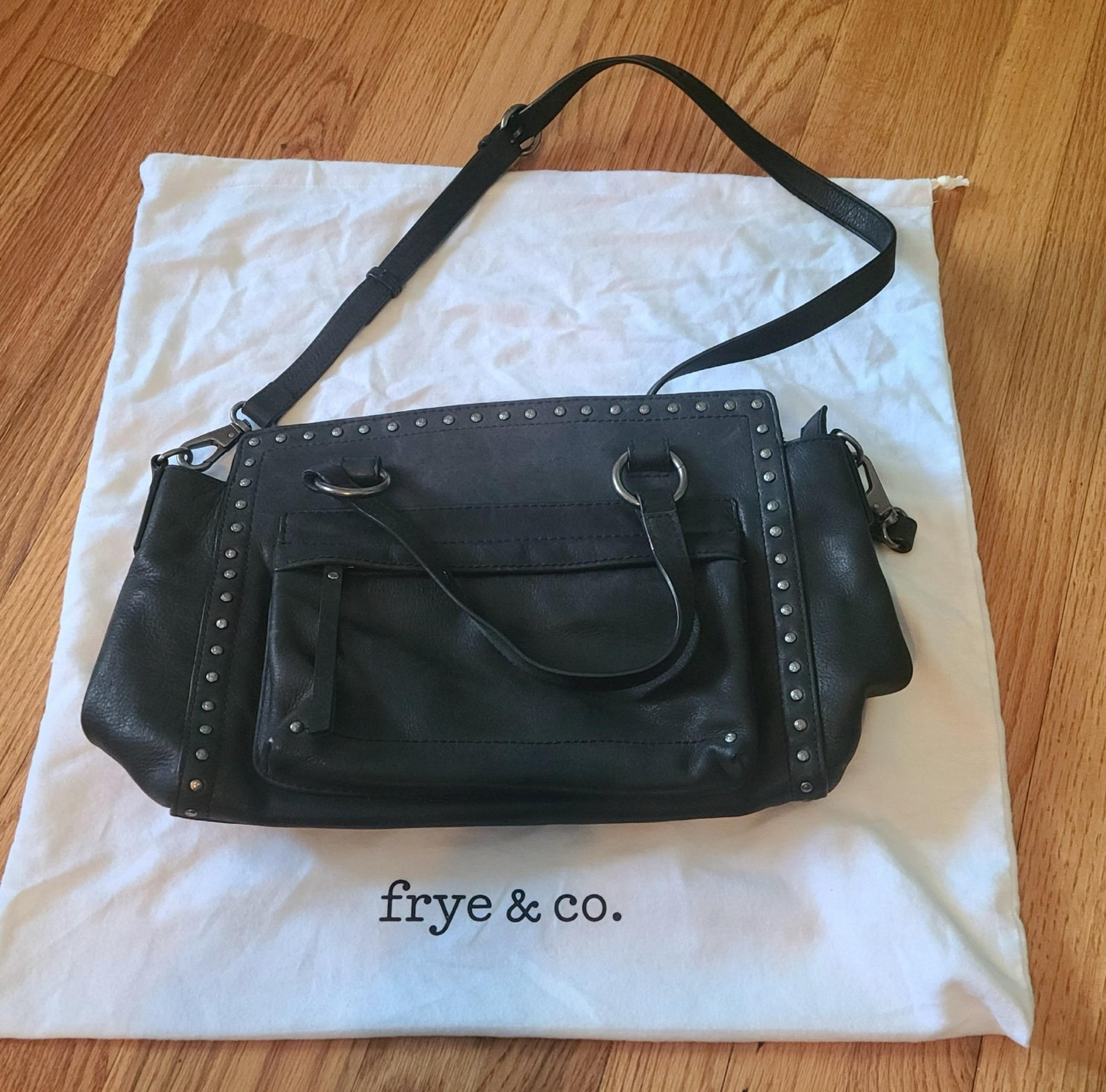 Frye black leather handbag with studded trim.