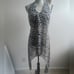 Joseph Ribkoff Zebra print v-neck asymmetric semi-sheer statement halter top_10