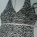 Joseph Ribkoff Zebra print v-neck asymmetric semi-sheer statement halter top_10