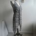 Joseph Ribkoff Zebra print v-neck asymmetric semi-sheer statement halter top_10