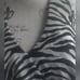 Joseph Ribkoff Zebra print v-neck asymmetric semi-sheer statement halter top_10