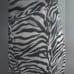 Joseph Ribkoff Zebra print v-neck asymmetric semi-sheer statement halter top_10