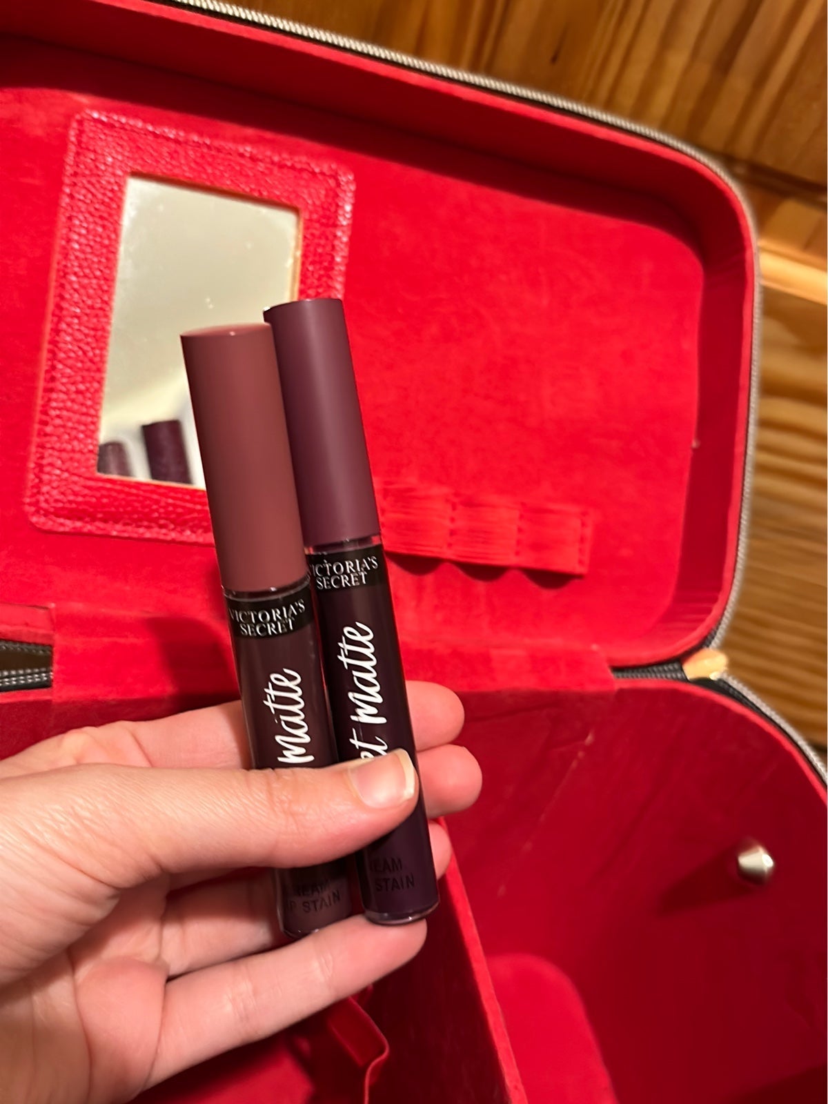 A makeup box with two New lip Cream from Victoria Secret