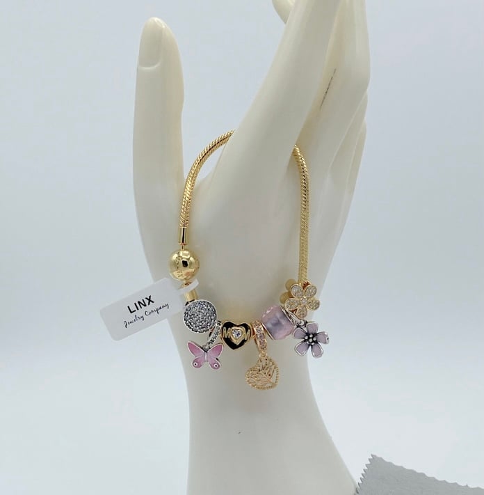 Linx Yellow Gold Snake Chain Bracelet with Gold and Pink Mom Themed Charms