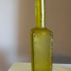 Vintage green glass bottle