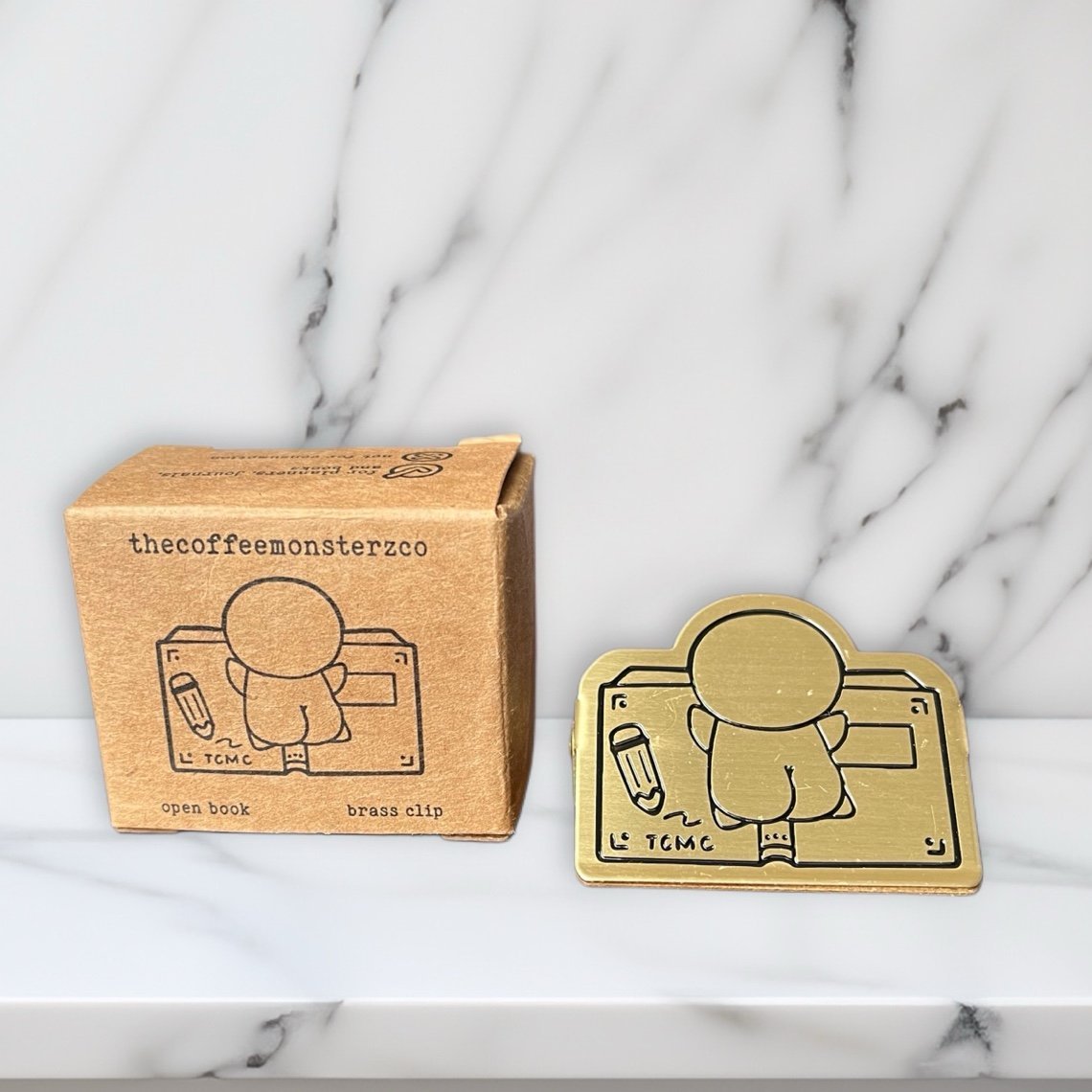TheCoffeeMonsterzCo TCMC | Open Book Q4 Sub Brass Clip