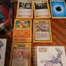 Pokémon cards,tin cans,card holders