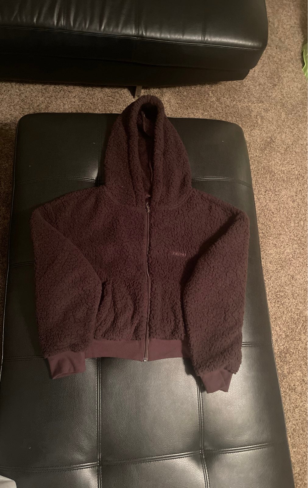 skims zip up