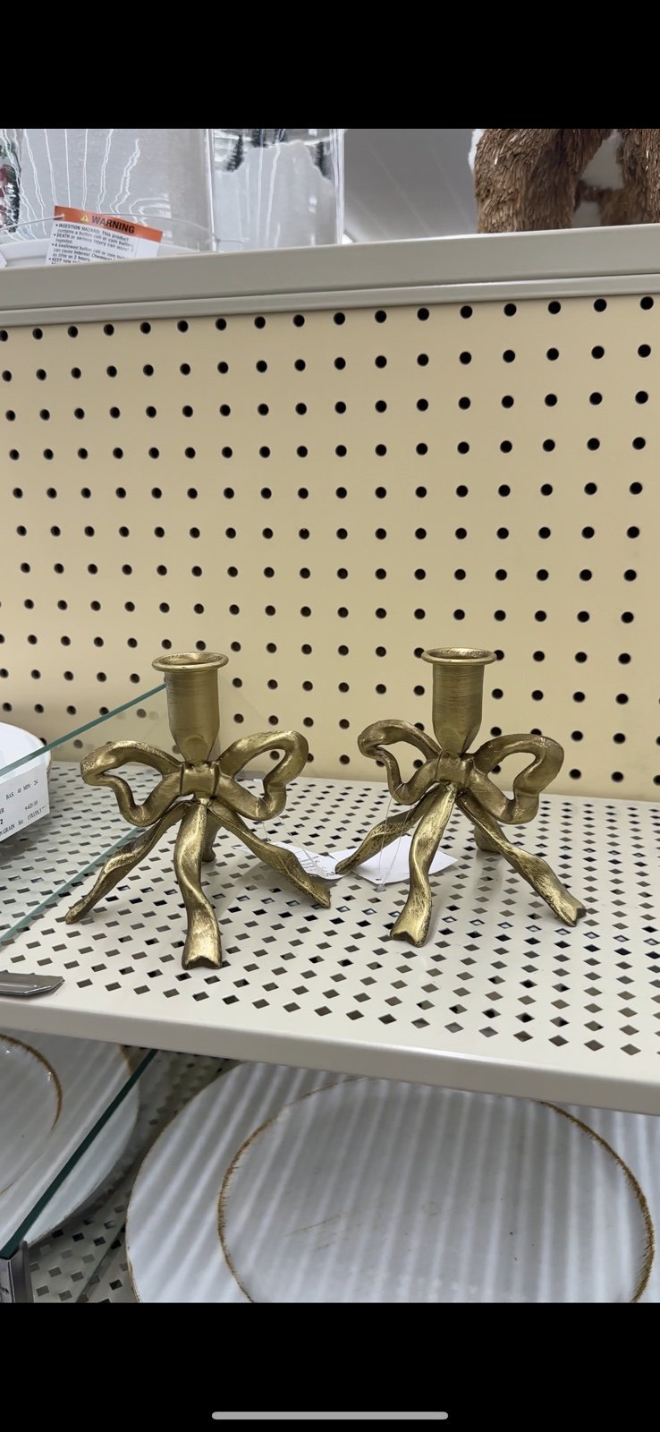 Gold bow candlestick holder