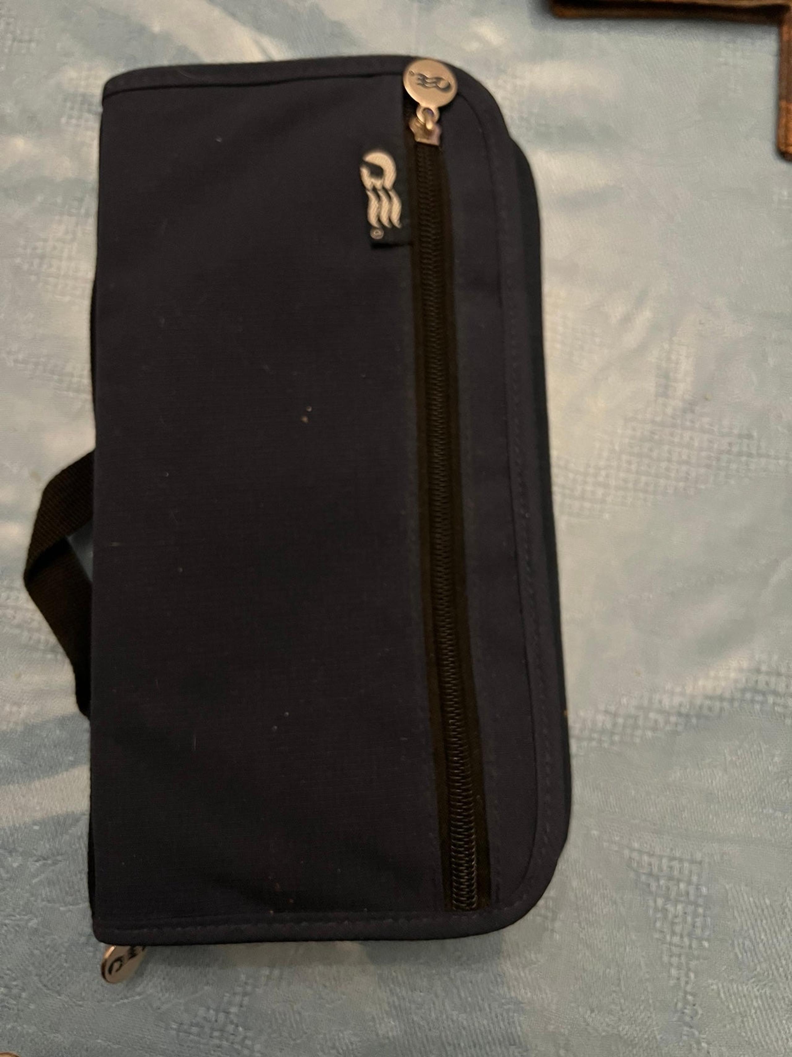 Travel case made by princess lines for passport charge cards and other documents