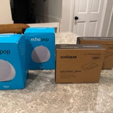 2 Amazon Echo Pop & 2 ECHO GEAR Shelves.